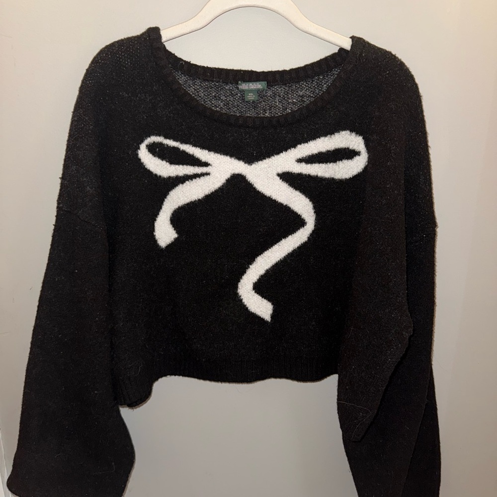 Black Sweater with White Bow Design
